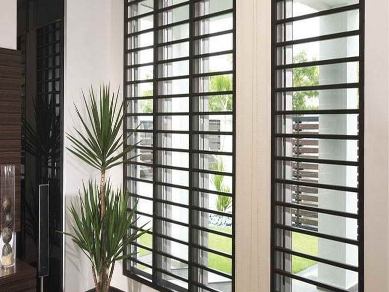 Modern stainless steel window grill in Hyderabad home